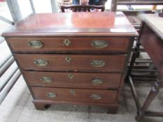 Mahogany chest of 4 graduated drawers.