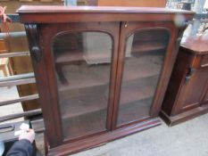 Mahogany glass fronted 4 shelf bookcase.