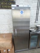 Single door stainless steel upright fridge. Estimate £100-120.