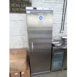 Single door stainless steel upright fridge. Estimate £100-120.