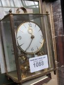6 various pictures and a carriage clock.