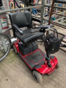 Mobility scooter and charger. Estimate £50-70.