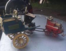 Four small models - Hansom Cab, Dog Cart, a Fire Engine, and a Model of a Dairy Cart and milkman