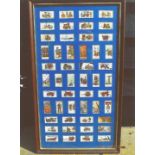 A framed display of fifty John Player & Son cigarette cards depicting firefighting applicances