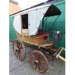 FOUR-WHEEL CARRIAGE for a single horse, possibly of Dutch origin, finished in natural varnished wood