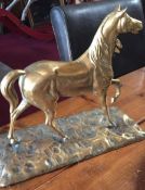 Heavy antique brass model of a horse in trot