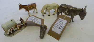 Three enamel models - Gypsy Wagon; donkey and a horse, along with a whitemetal mule money box and