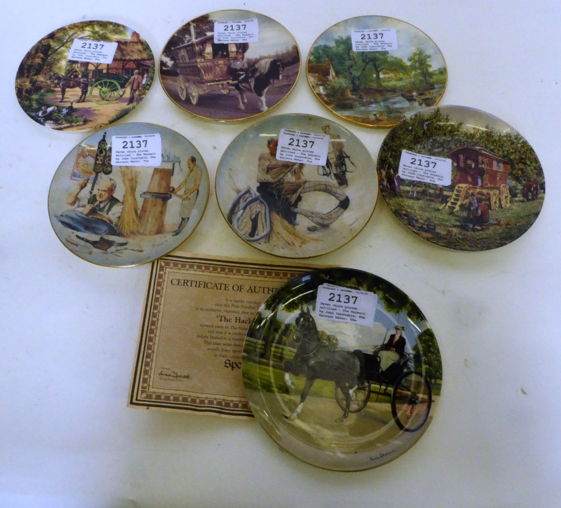 Seven china plates entitled - The Haywain by John Constable; The Harness Maker; The Horse Collar