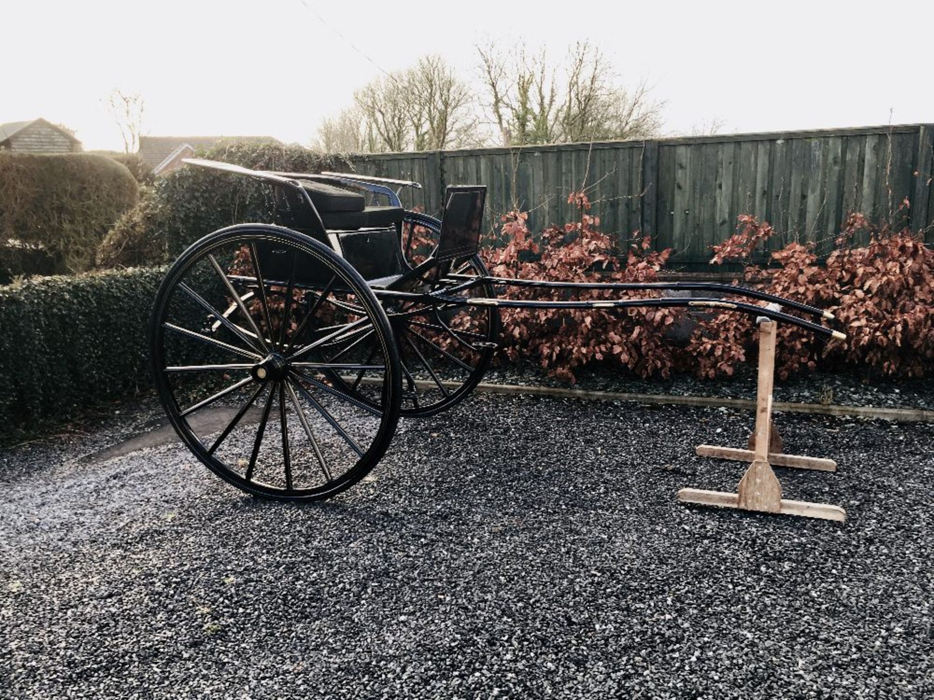 STICK BACK GIG built by Barker & Co. of London to suit 14.2 to 16 hh; painted black with gold