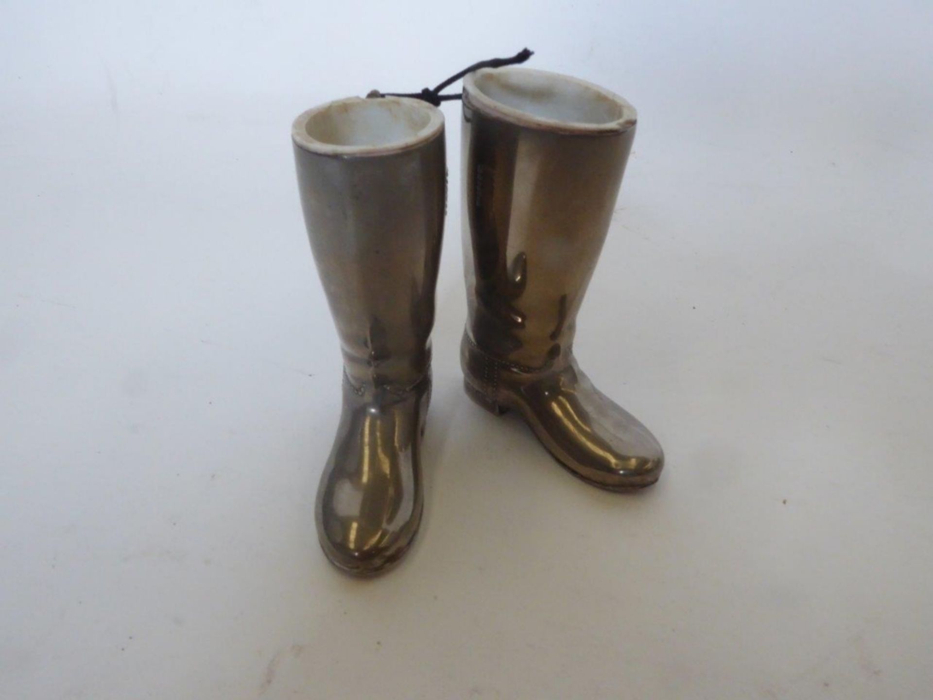 Model of a pair of hunting boots. Height 8.5 cms