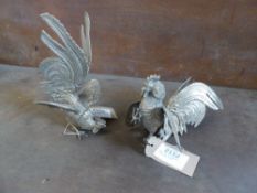 Pair of whitemetal fighting cocks