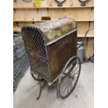 TWO-WHEEL METAL COVERED DAIRY CART on spoked wheels with iron treads. Fitted with carry handles