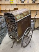 TWO-WHEEL METAL COVERED DAIRY CART on spoked wheels with iron treads. Fitted with carry handles