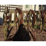 Set of brown leather pony TANDEM harness made by Huskissons of Walsall, with brass fittings,