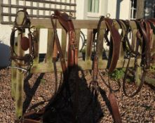 Set of brown leather pony TANDEM harness made by Huskissons of Walsall, with brass fittings,