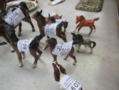 8 various Beswick models such as a foal, hounds, sleeping fox, etc