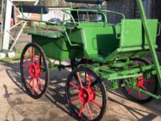 EXERCISE CARRIAGE painted green and approx. 15 years old to take full size pair. Measures 9ft long x