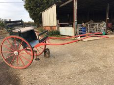 EXERCISE CART to suit 14.2 to 16hh. Painted black on a red undercarriage with cream buttoned