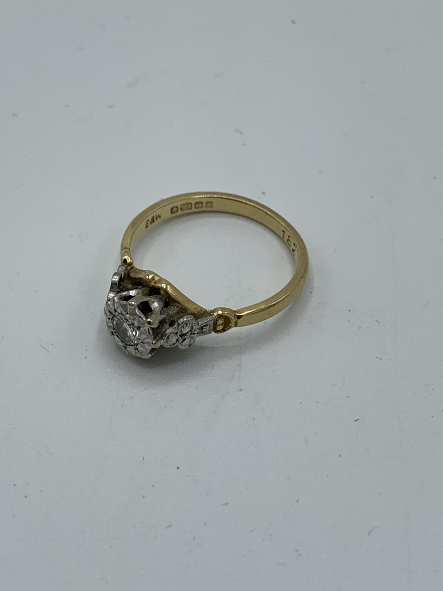 18ct gold solitaire diamond ring, size J, weight 2.6gms. Estimate £150-180. - Image 2 of 2