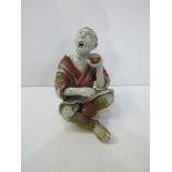 Japanese figurine of a beggar, as found, height 14cms. Estimate £100-150.