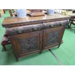 Oak sideboard with carved drawers and cupboard doors, 137 x 53 x 98cms. Estimate £10-20