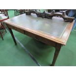 Mahogany writing table with leather skiver and 3 frieze drawers. 140 x 84 x 76cms. Estimate £20-40.