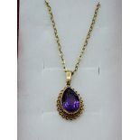 9ct yellow gold amethyst necklace. Estimate £30-40.