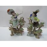 Pair of Scheibe-Alsbach figurines of a girl standing on a bench and boy standing on a bench (the