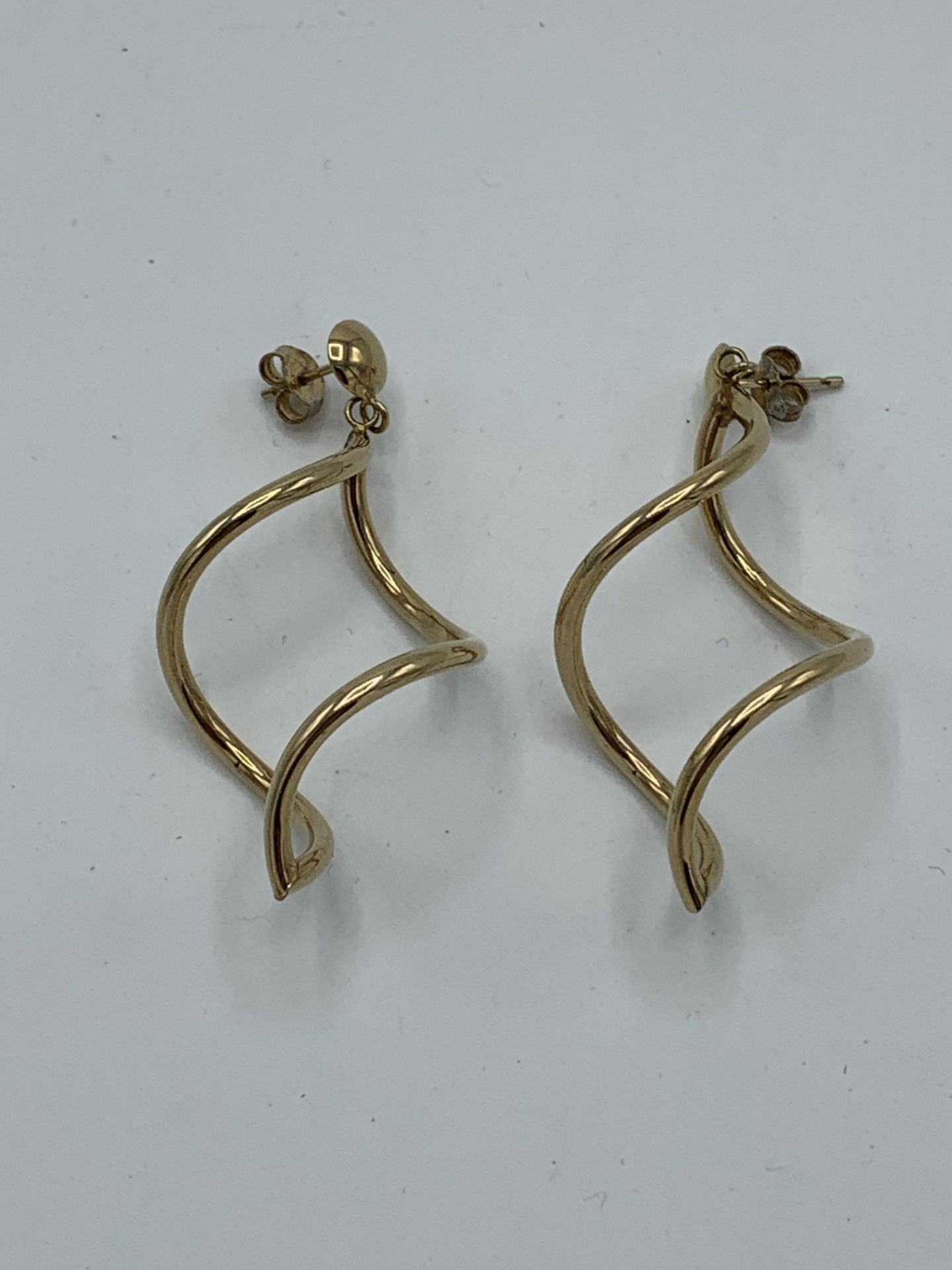 9ct gold twirly drop earrings, weight 2.6gms. Estimate £20-30. - Image 2 of 2