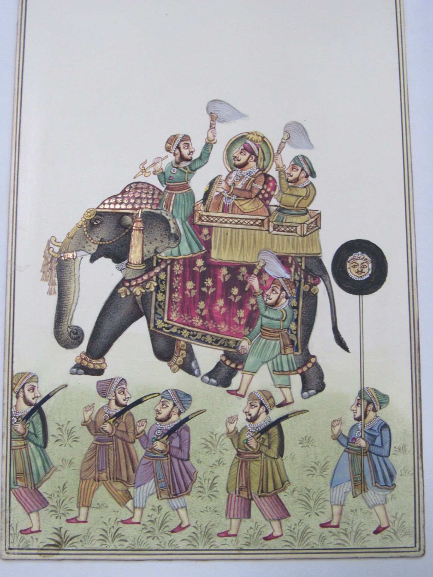 Miniature Indian watercolour of elephant and swordsmen, unframed. Estimate £35-50.