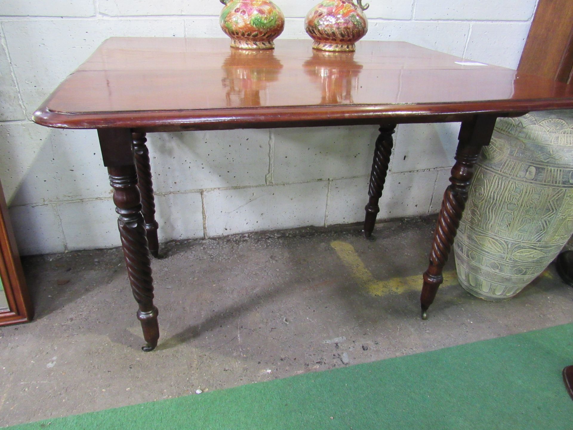 Mahogany Pembroke table on spiral turned legs to casters. 90 x 100 (open) x 70. Estimate £30-50. - Image 2 of 3