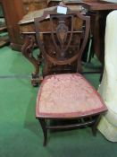 Inlaid mahogany shield back nursing chair. Estimate £10-20.