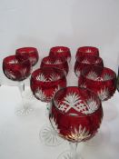 7 ruby cut to clear Hoch glasses and 2 other similar. Estimate £50-80.