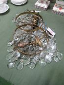 2 brass and glass droplet chandeliers. Estimate £20-30.