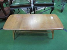 Ercol-style coffee table with railed shelf beneath, 105 x 46 x 37cms. Estimate £20-30.