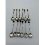 2 sets of 6 silver coffee bean spoons both hallmarked Sheffield, 1934 & 1920. Estimate £30-40.