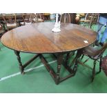 18th Century oak gate-leg table, 160 (open) x 130 x 75cms. Estimate £80-120.