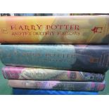 5 x Harry Potter books US versions 4 of which are 1st editions. Estimate £20-40.