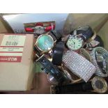 Box of watches and costume jewellery. Estimate £20-30.