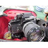 Nikon F2 camera in bag together with a second lens; Pentax Spotmatic F Camera;