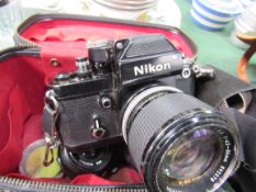 Nikon F2 camera in bag together with a second lens; Pentax Spotmatic F Camera;