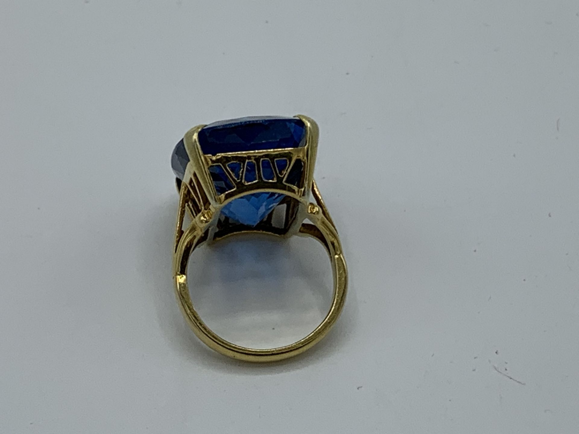 9ct gold and London blue Topaz ring 9.9gms, size H, stone 2 x 1.5cms. Estimate £500-600. - Image 3 of 3