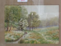 Framed & glazed watercolour of trees & stream signed by H L Brewer. Estimate £10-20.