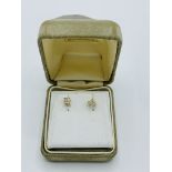 9ct gold and diamond stud earrings, diamonds approx 1/4ct. Estimate £40-50.