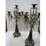 A pair of 5 branch ormolu and glass candle drops, height 45cms. Estimate £50-100.