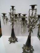 A pair of 5 branch ormolu and glass candle drops, height 45cms. Estimate £50-100.