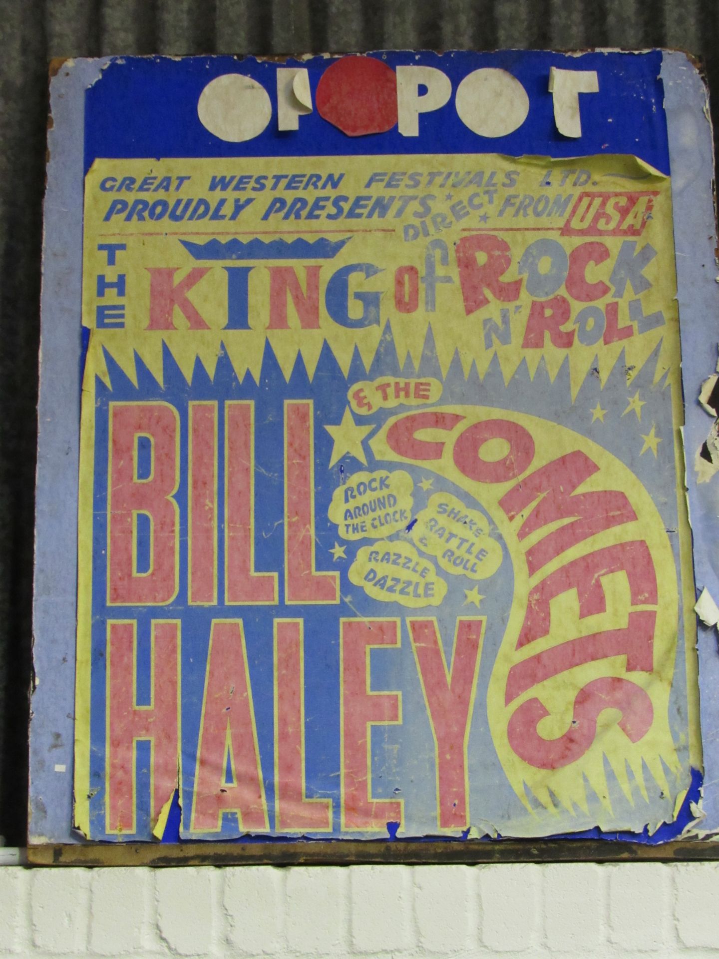 Bill Haley and the Comets original billboard poster on its hoarding. This poster advertised a