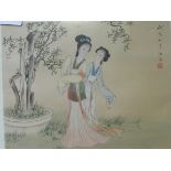 A pair of framed and glazed Japanese paintings on silk of female figures; framed and glazed