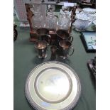 Wooden tantalus of 3 decanters; 4 silver-plated tankards and a silver-plated plate. Estimate £20-