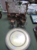 Wooden tantalus of 3 decanters; 4 silver-plated tankards and a silver-plated plate. Estimate £20-